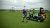 playing golf at Trump Golf links in the Bronx